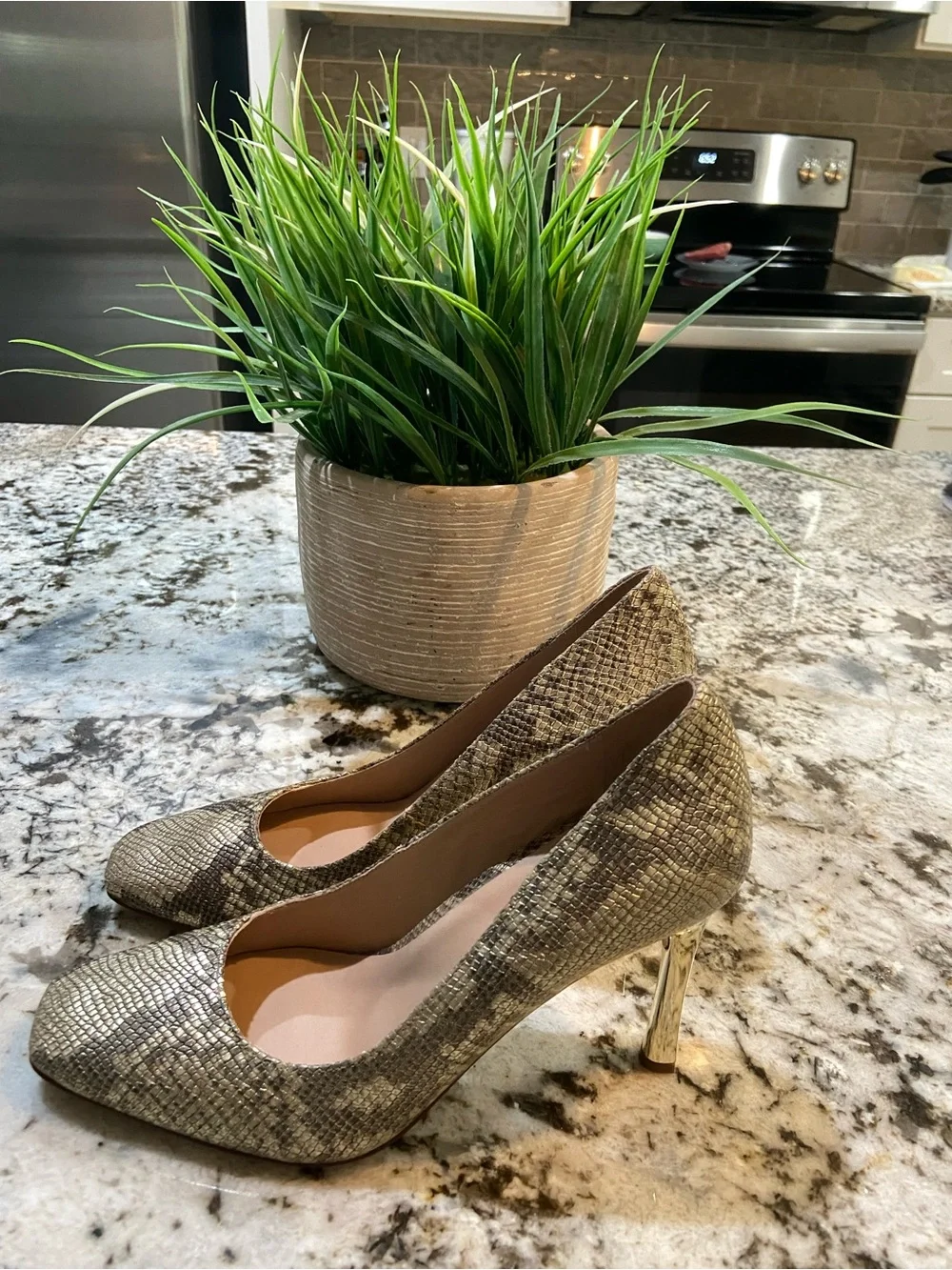 27 EDIT snake print heels